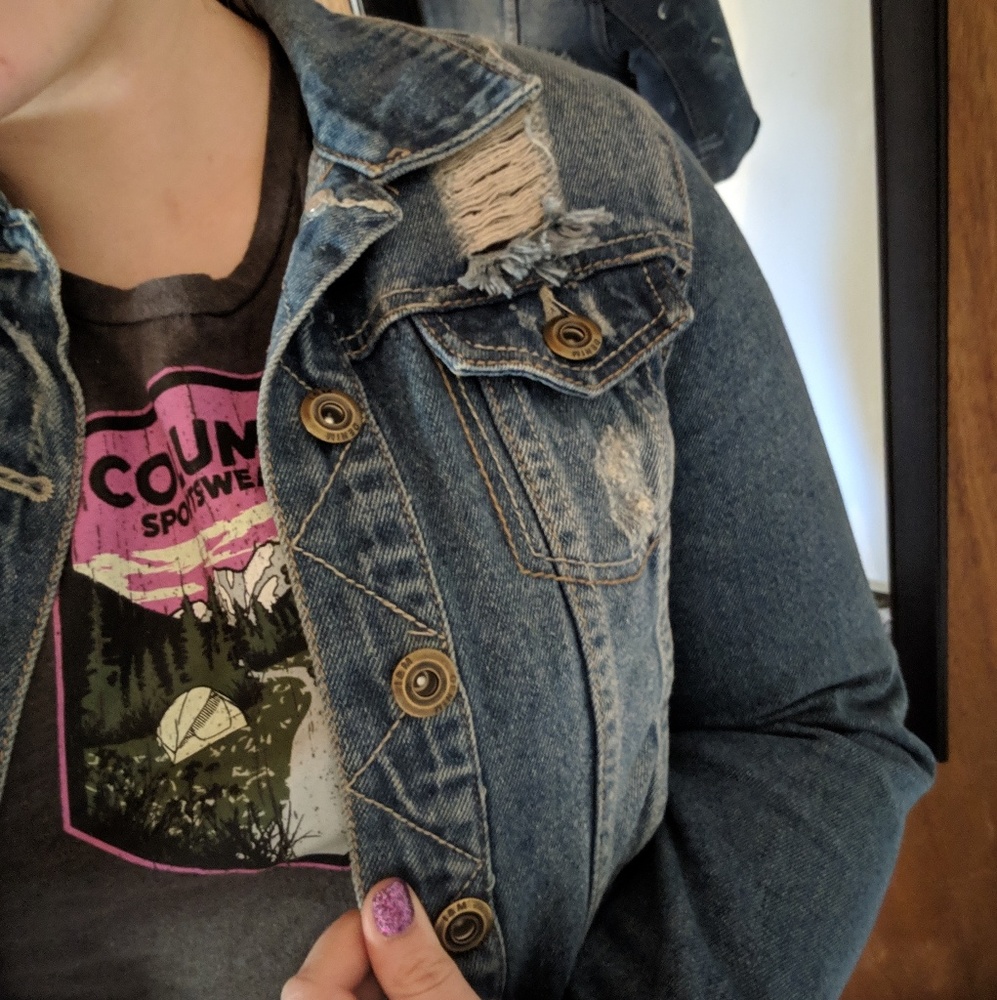 Distressed denim jacket